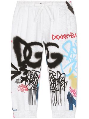 Dolce & Gabbana Kids graffiti-print tracksuit bottoms - White