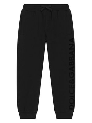 Dolce & Gabbana Kids logo-flocked cotton track pants - Black