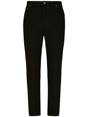 Dolce & Gabbana logo-appliqué tapered-leg jeans - Black