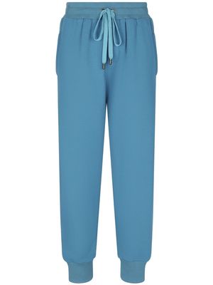 Dolce & Gabbana logo-embossed drawstring track pants - Blue