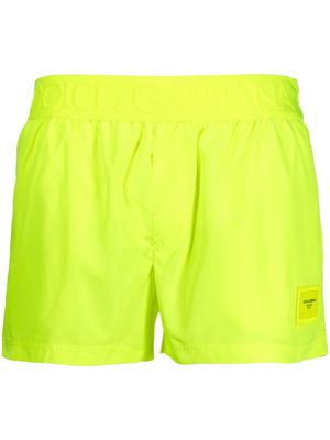 Dolce & Gabbana logo-patch swim shorts - Yellow