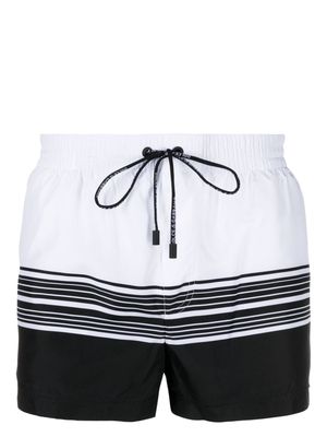 Dolce & Gabbana logo-print striped swim shorts - White