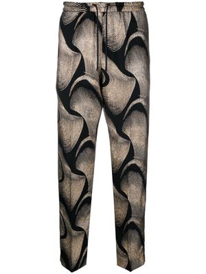 DRIES VAN NOTEN Optical-swirl-print lurex trousers - Black