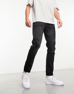 DTT rigid slim fit ripped jeans in washed black