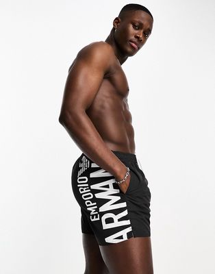 Emporio Armani Bodywear vertical logo swim shorts in black