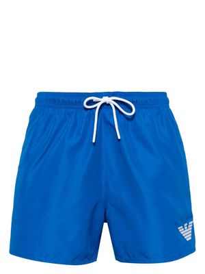 Emporio Armani eagle logo-embroidered swim shorts - Blue