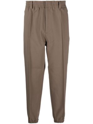 Emporio Armani elasticated-waist tapered trousers - Brown