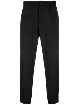 Emporio Armani elasticated-waistband tapered trousers - Black
