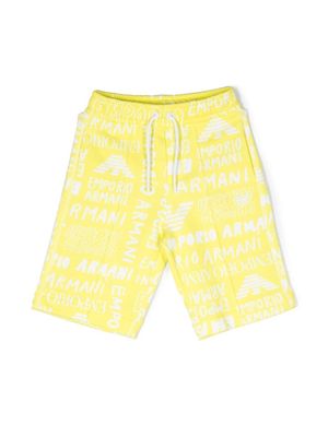 Emporio Armani Kids all-over logo-print shorts - Yellow