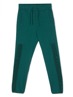 Emporio Armani Kids logo-embossed tapered track pants - Green
