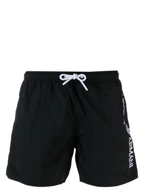 Emporio Armani logo-embroidered swim shorts - Black