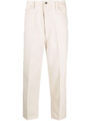 Emporio Armani logo-patch pressed-crease tapered jeans - Neutrals