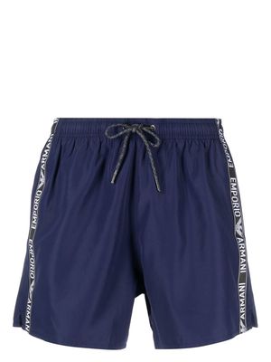 Emporio Armani logo-stripe swim shorts - Blue