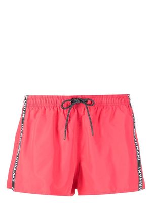 Emporio Armani logo-stripe swim shorts - Pink
