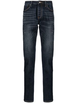 Emporio Armani paint-splatter slim-cut jeans - Blue