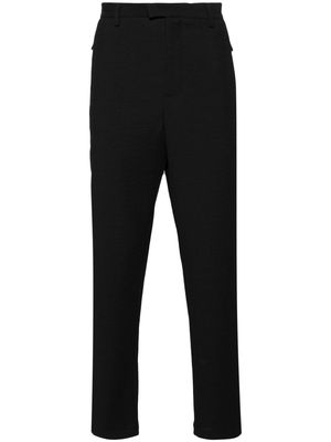 Emporio Armani seersucker-textured tapered-leg trousers - Black