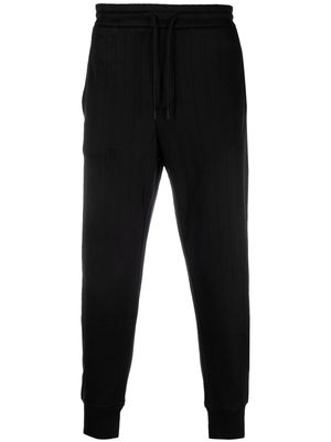Emporio Armani stripe-pattern track pants - Black
