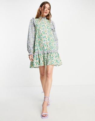 Envii high neck mini dress with ruffle details in patchwork floral-Green