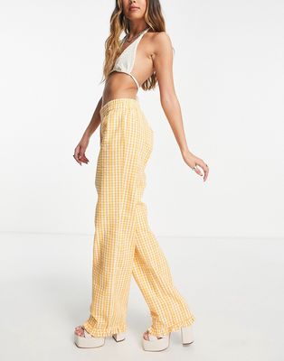 Envii straight leg pants with ruffle hem in apricot check - part of a set-Orange