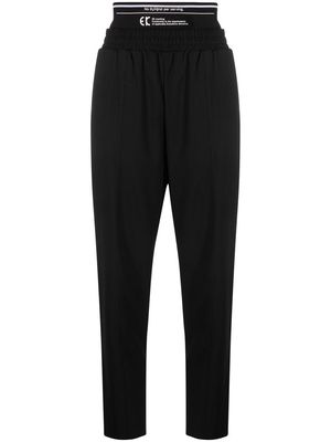 EVISU logo-waistband tapered trousers - Black