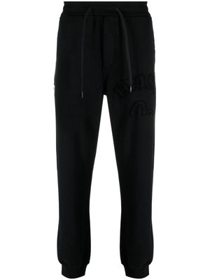 EVISU seagull-appliqué drawstring cotton track pants - Black