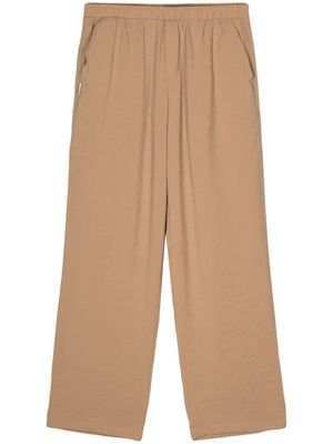 Family First logo-tag loose-fit trousers - Neutrals