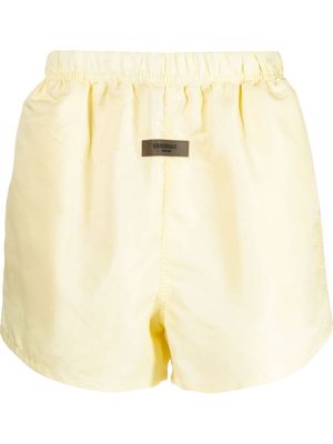 FEAR OF GOD ESSENTIALS logo-patch track shorts - Yellow