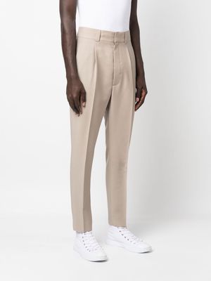 Fear Of God pleated tapered-leg trousers - Neutrals