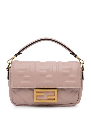 Fendi Pre-Owned 2012-2023 mini monogram-embossed FF plaque Baguette handbag - Pink