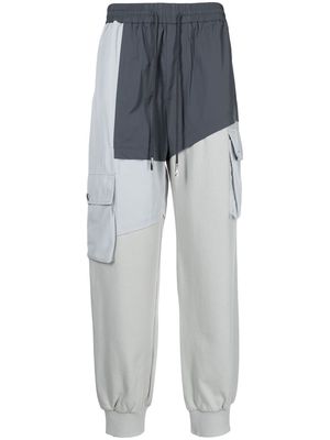 Feng Chen Wang patchwork cargo track pants - Grey