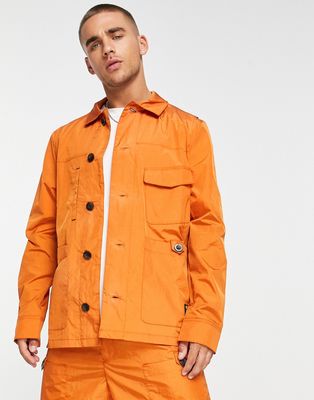 Fila utility jacket in burnt orange