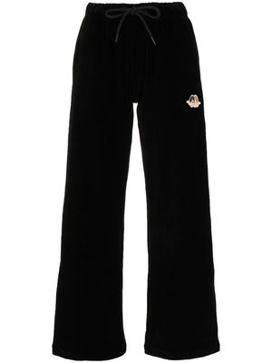 Fiorucci Angel-patch velour trousers - Black
