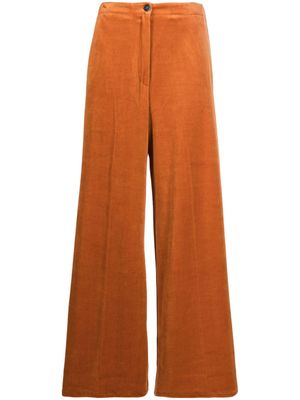 Forte Forte pressed-crease velvet flared trousers - Orange