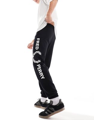 Fred Perry graphic branded sweatpants in black