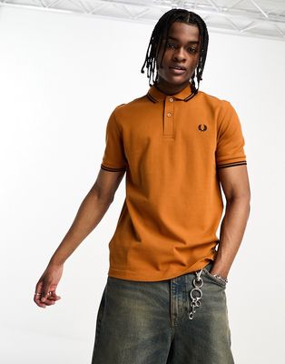 Fred Perry twin tipped polo shirt in burnt orange