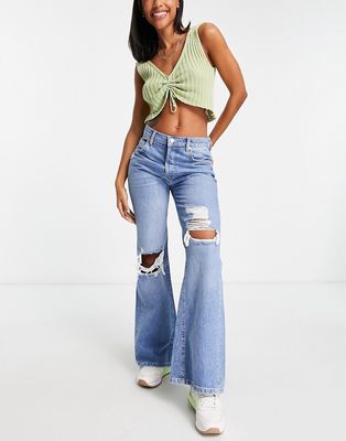 Free People new dawn rip detail flare in victoria blue