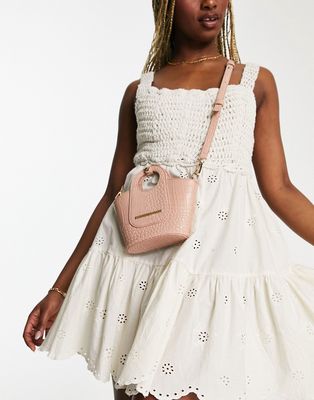 French Connection structured cross-body bag with circle handle in blush pink