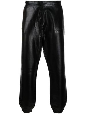 GALLERY DEPT. Analog logo-embossed tapered trousers - Black