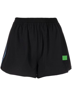 GANNI logo-embossed elasticated-waist track shorts - Black