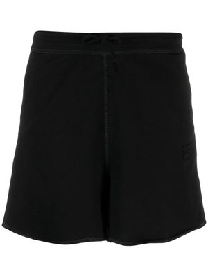 GANNI logo-patch short shorts - Black