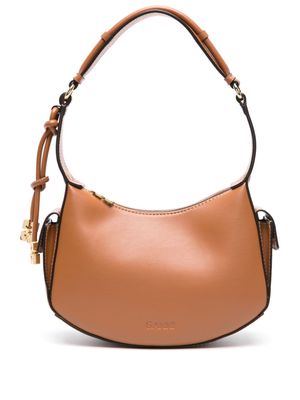 GANNI Swing logo-charm shoulder bag - Brown