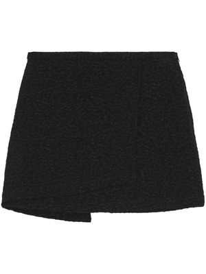 GANNI wrap-design textured miniskirt - Black