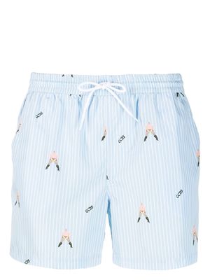 Gcds cartoon-print pinstripe shorts - Blue