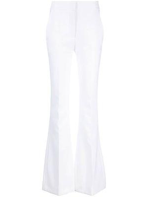 Genny high-waisted flared trousers - White