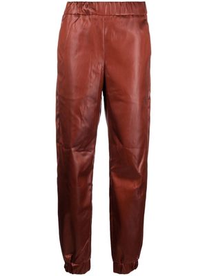 Genny high-waisted tapered trousers