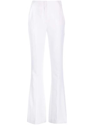 Genny Iconic high-waist flared trousers - White