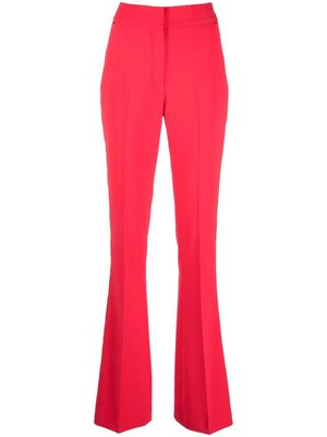 Genny pressed-crease flared tailored trousers - Pink