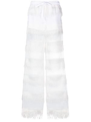 Genny semi-sheer fringed trousers - White