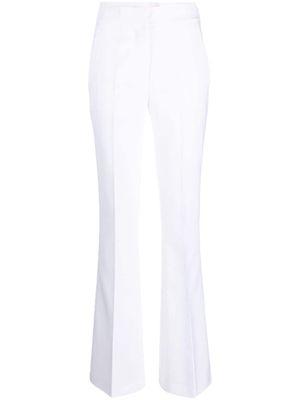 Genny tailored-cut flared trousers - White