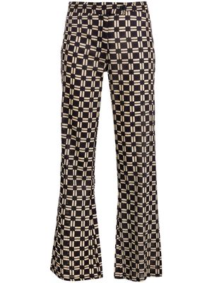 Gimaguas geometric-print disco trousers - Black